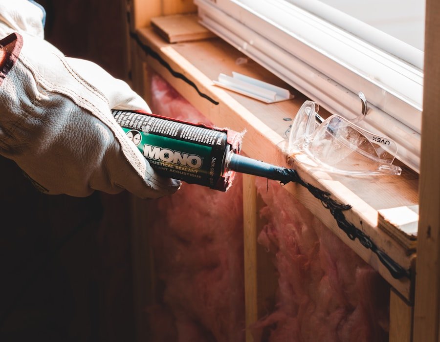 Sealant being applied around the perimeter of a window frame during installation