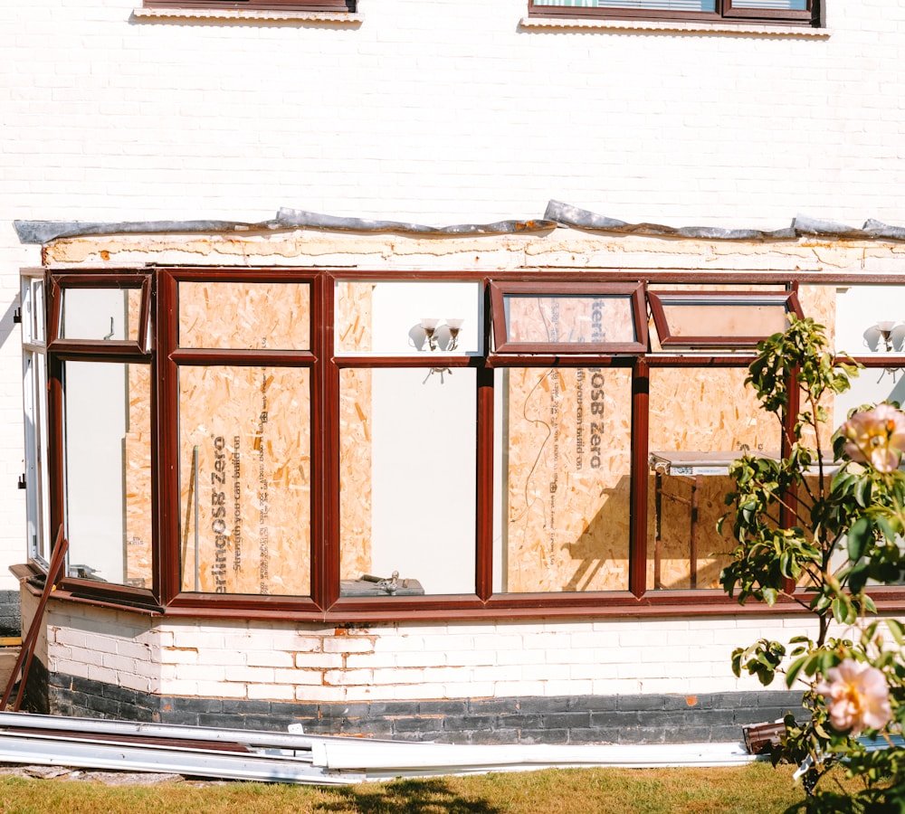 A new window frame set into a wall under construction