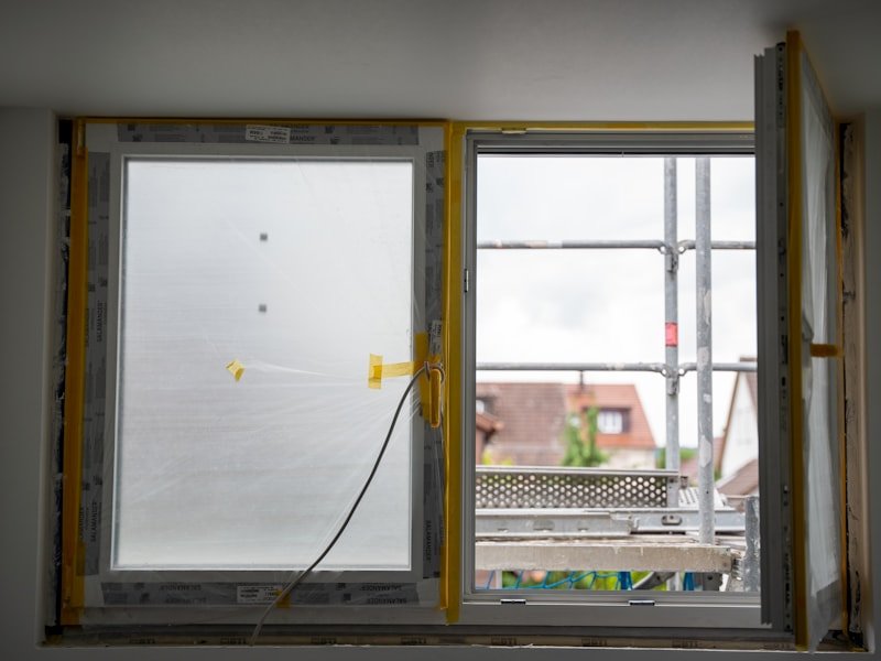 A window opening stripped back during construction with scaffolding outside